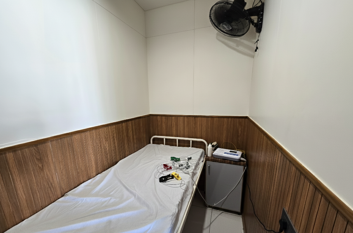 A dedicated room with modern ECG equipment.